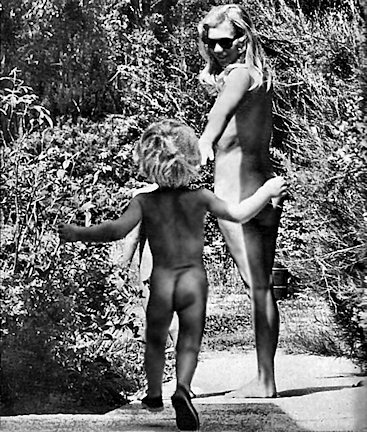 A toddler catches up with mum