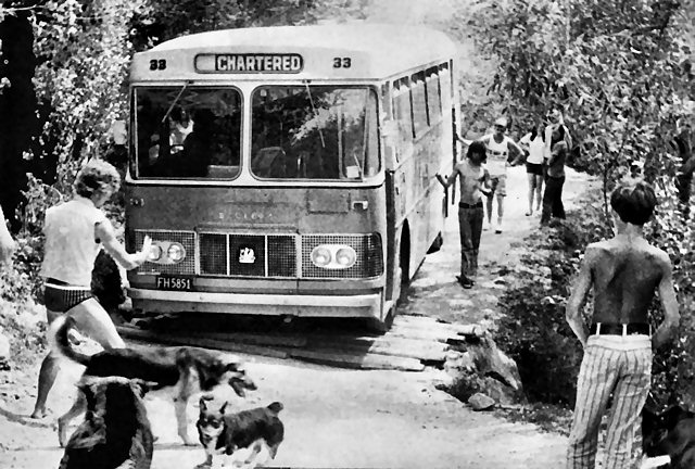 The NYC bus negotiates a crossing